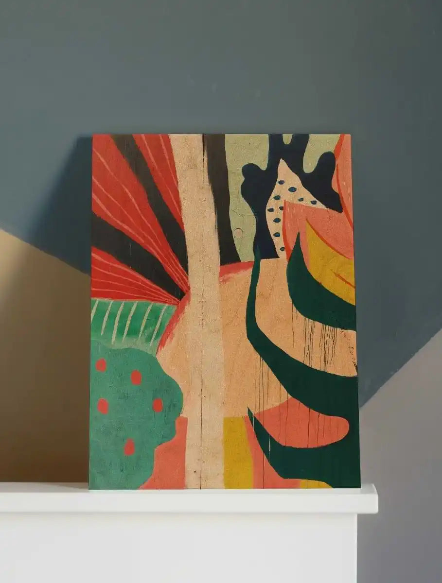 Abstract art piece featuring bold curved shapes in coral, turquoise, black, and yellow on a natural wood panel.